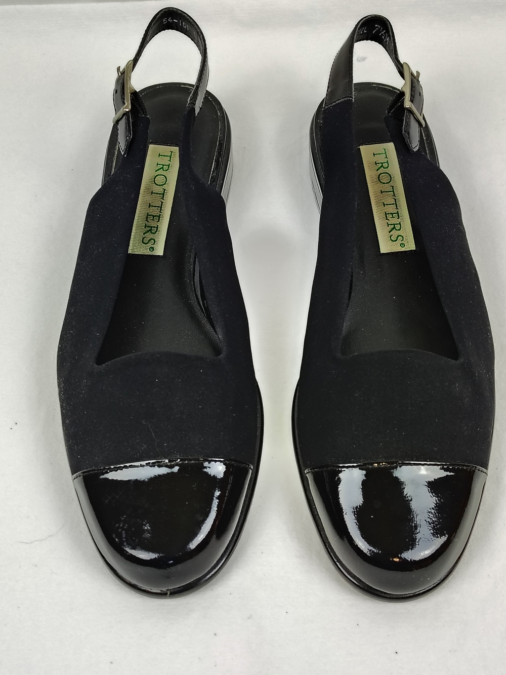 Women's Trotters Black Slingback Cap-Toe Mules
